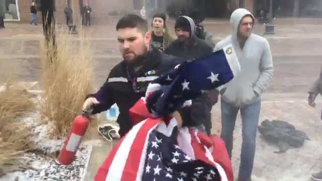 FedEx driver stops flag burning, company supports him