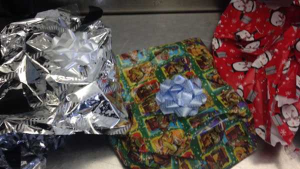DOJ: Man tries to smuggle heroin in Christmas wrapping onto Cincinnati-bound plane - WLWT Cincinnati