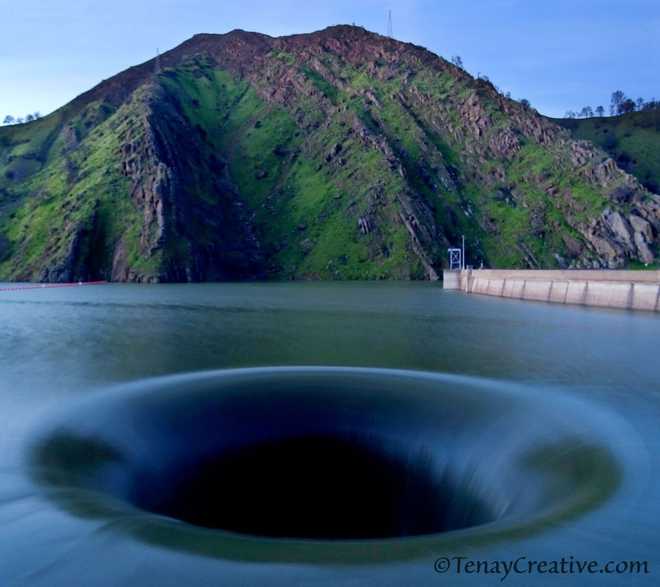 Lake Berryessa's Morning Glory Hole spills over, provides unexpected