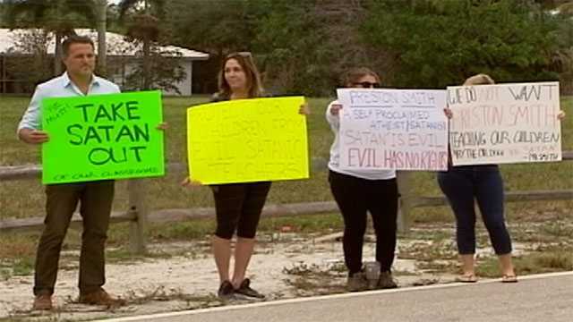 Protest held against teacher who displayed satanic symbol - WPBF West Palm Beach