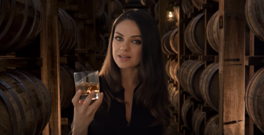 Angry bourbon drinkers are boycotting Jim Beam because of Mila Kunis