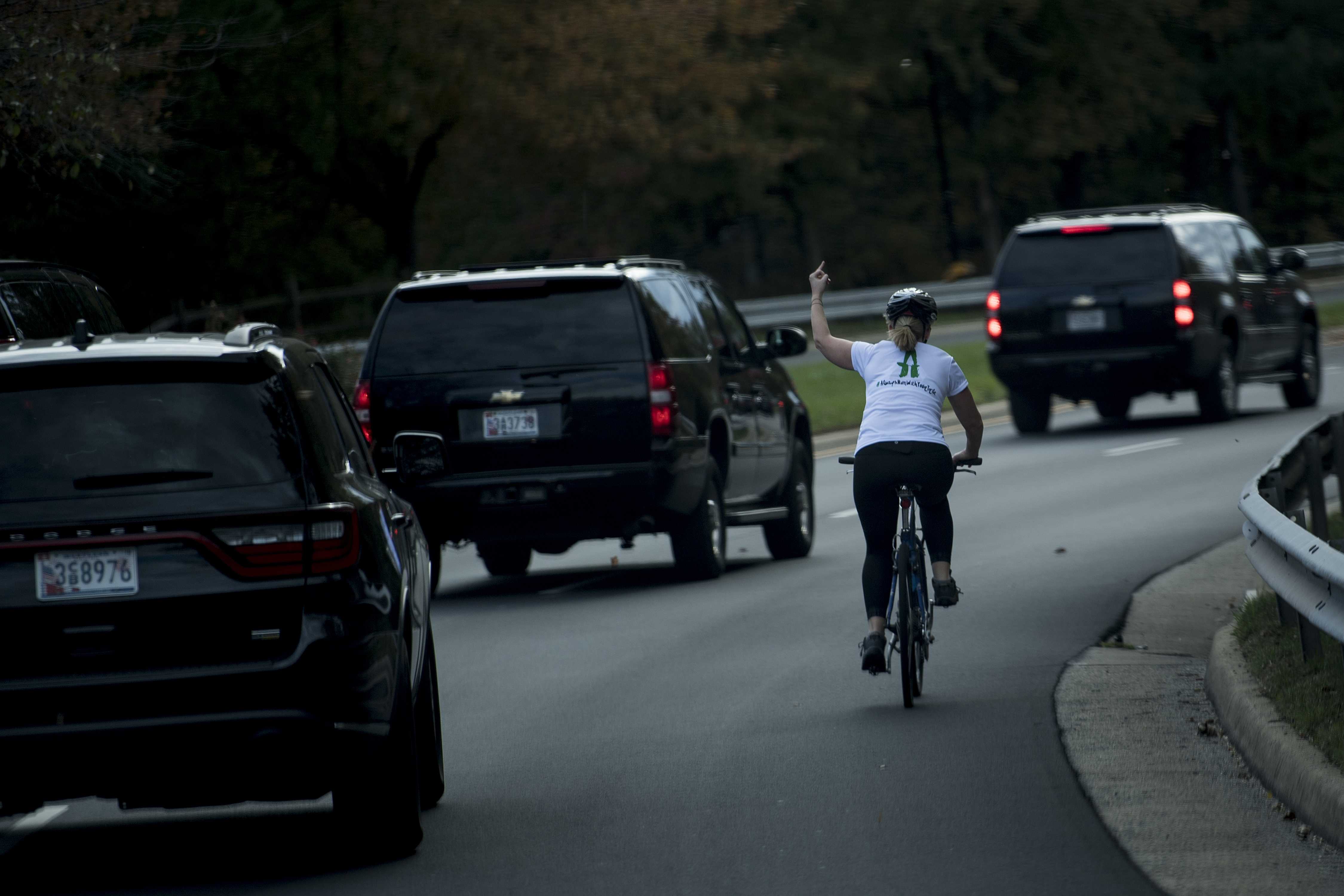 The woman who went viral for flipping off Trump's motorcade has been fired