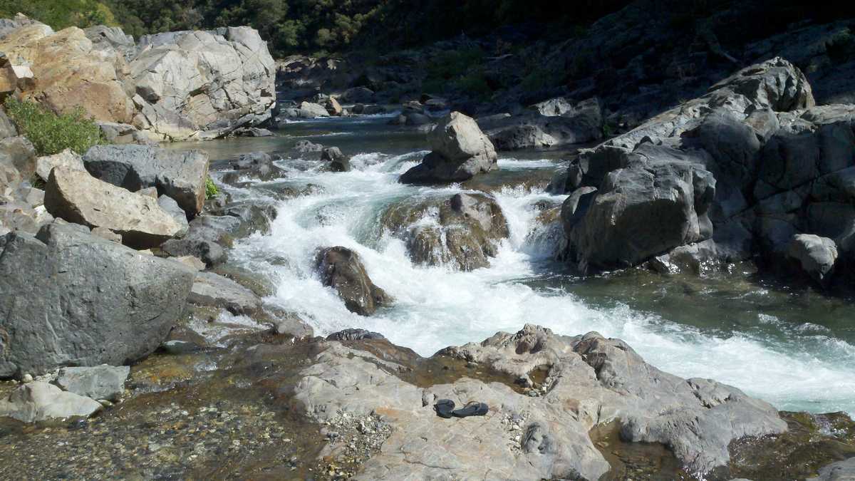 Photos Swimsuits optional at Mountain Dog swimming hole