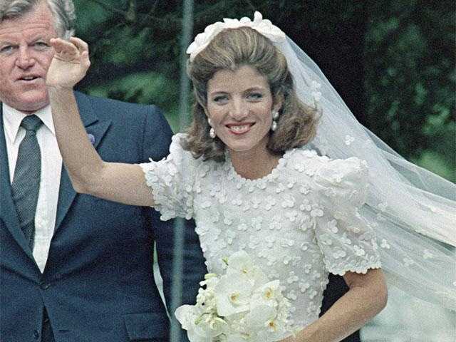 Photos Jackie Caroline Kennedy Through The Years Caroline Waves As She Leaves The Church With Her Uncle Ted Kennedy