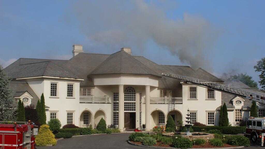 Photos: $3 million mansion ravaged by fire