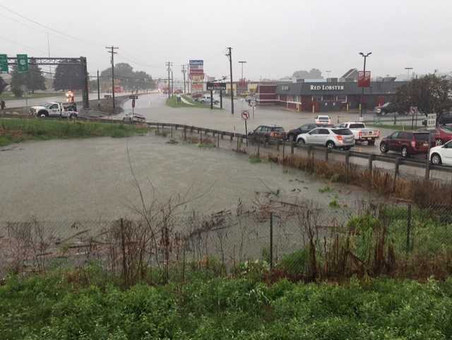 PHOTOS: Intense rain floods area roadways