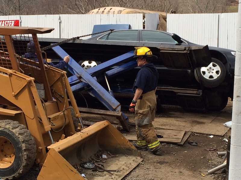 Photos Vehicle falls off lift at Butler County garage