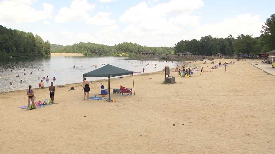 People cooled off Sunday at Oak Mountain State Park beach during ...