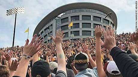 Thousands of football fans wave in unison to kids in hospital