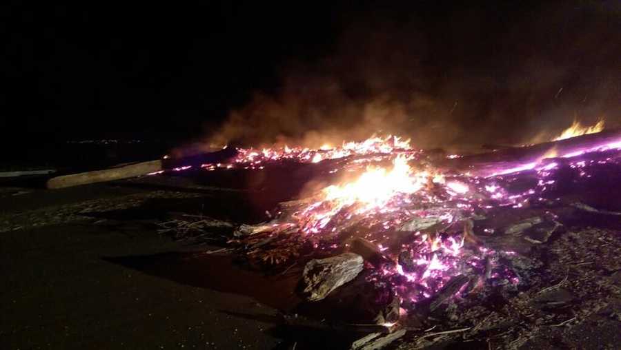 Pile of driftwood around Folsom Lake catches fire