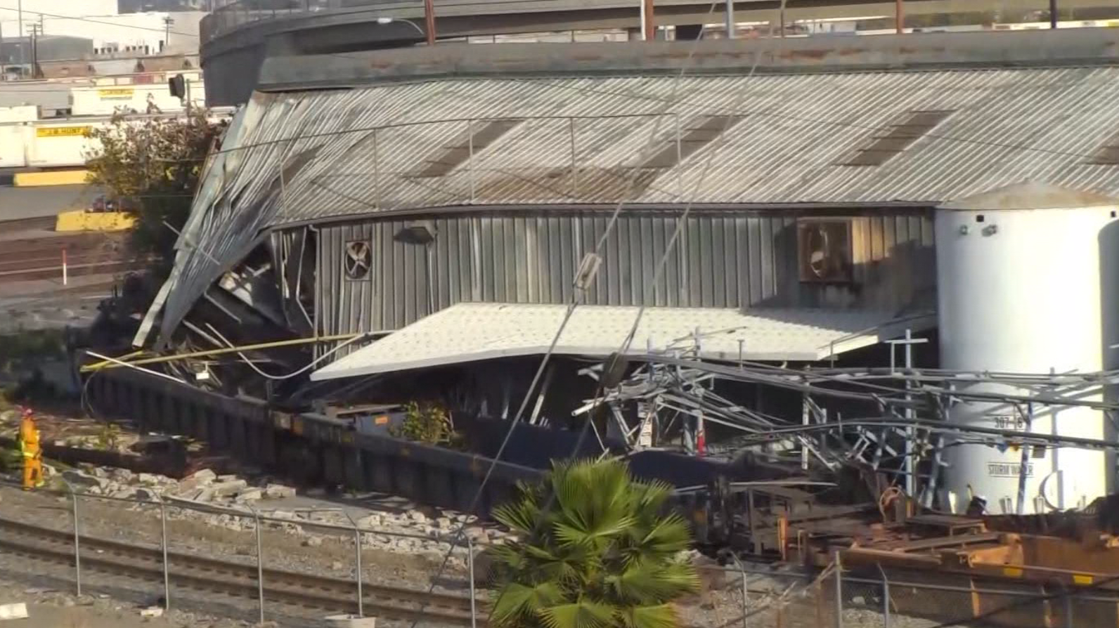 Freight train derails in SoCal, smashing building