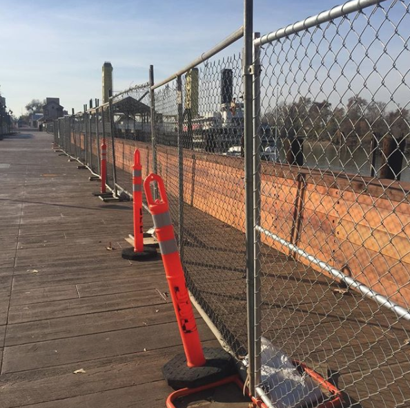 New Year's Eve revelers to watch fireworks from behind fences