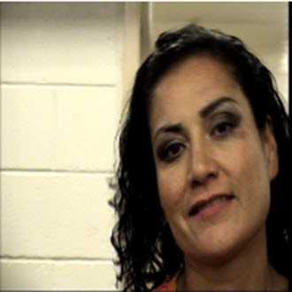 Woman accused of trashing officer memorial due in court