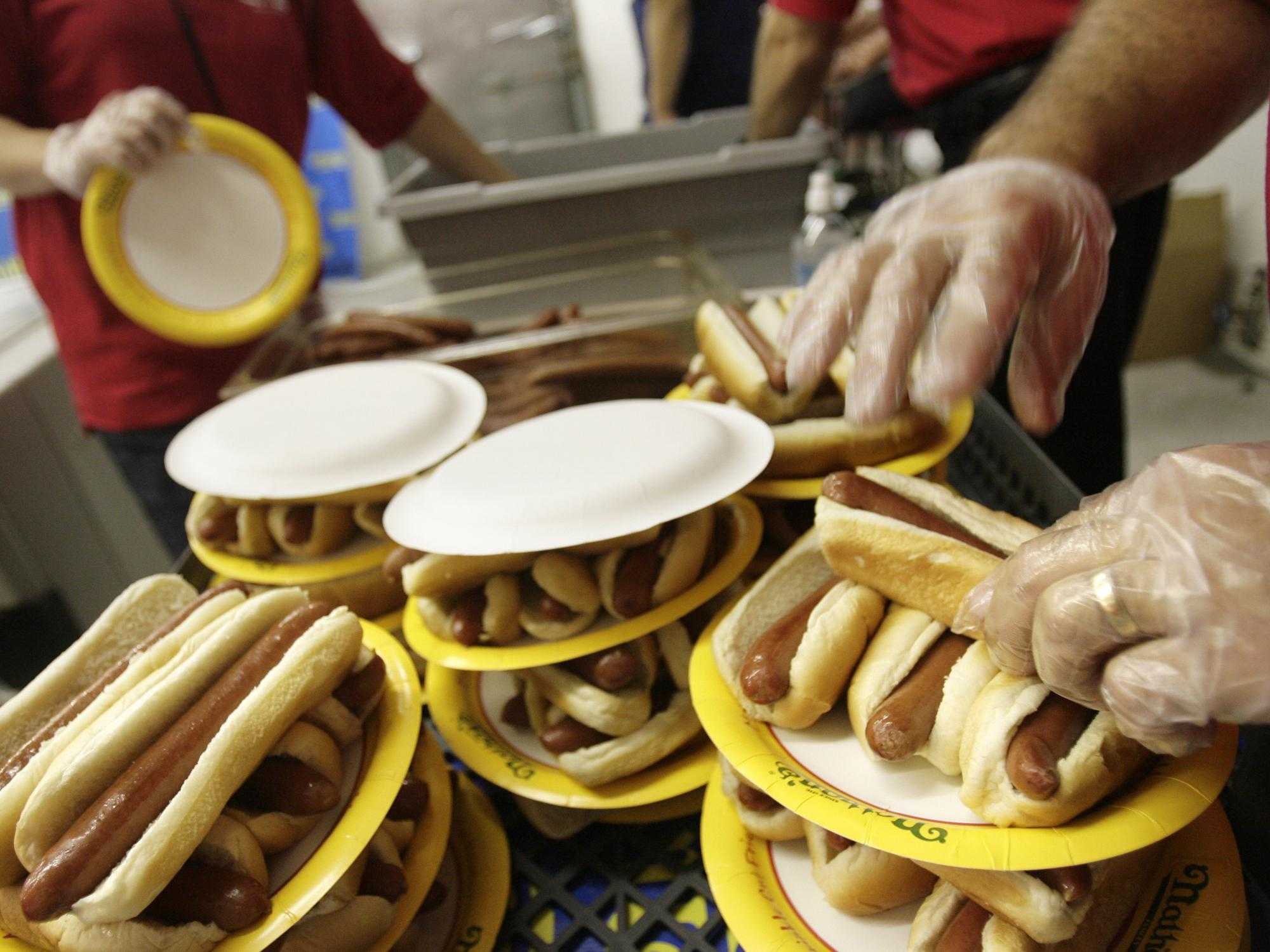 Woman wins famous hot dog eating contest