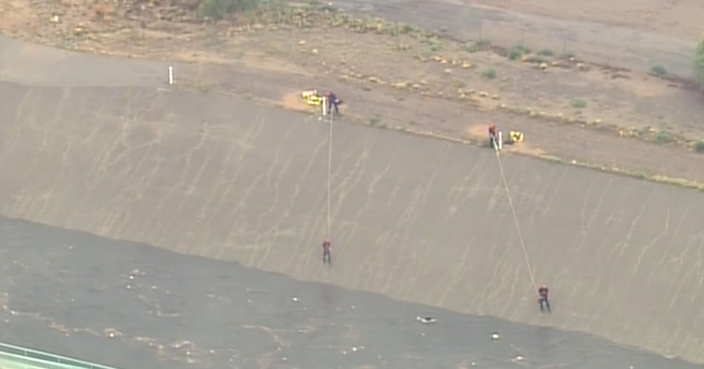 Rescue crews searching for man possibly swept away in arroyo