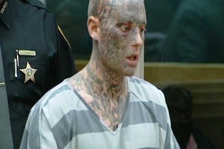 Body camera shows violent arrest of heavily tattooed man