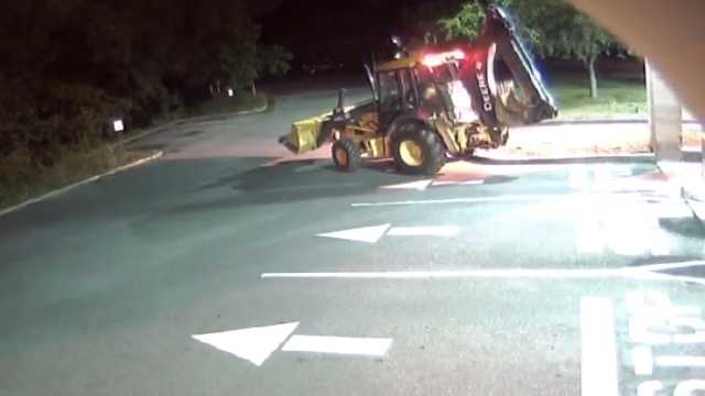 Caught on camera: Backhoe smashes open ATM
