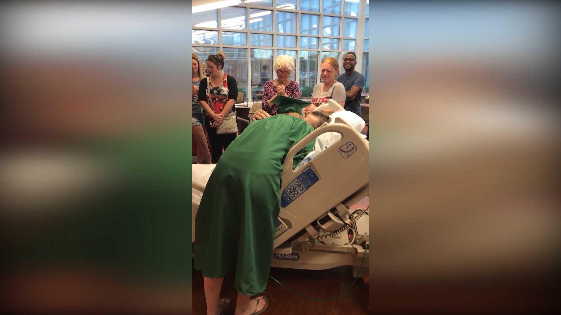 Surprise ceremony allows hospitalized dad to see daughter graduate