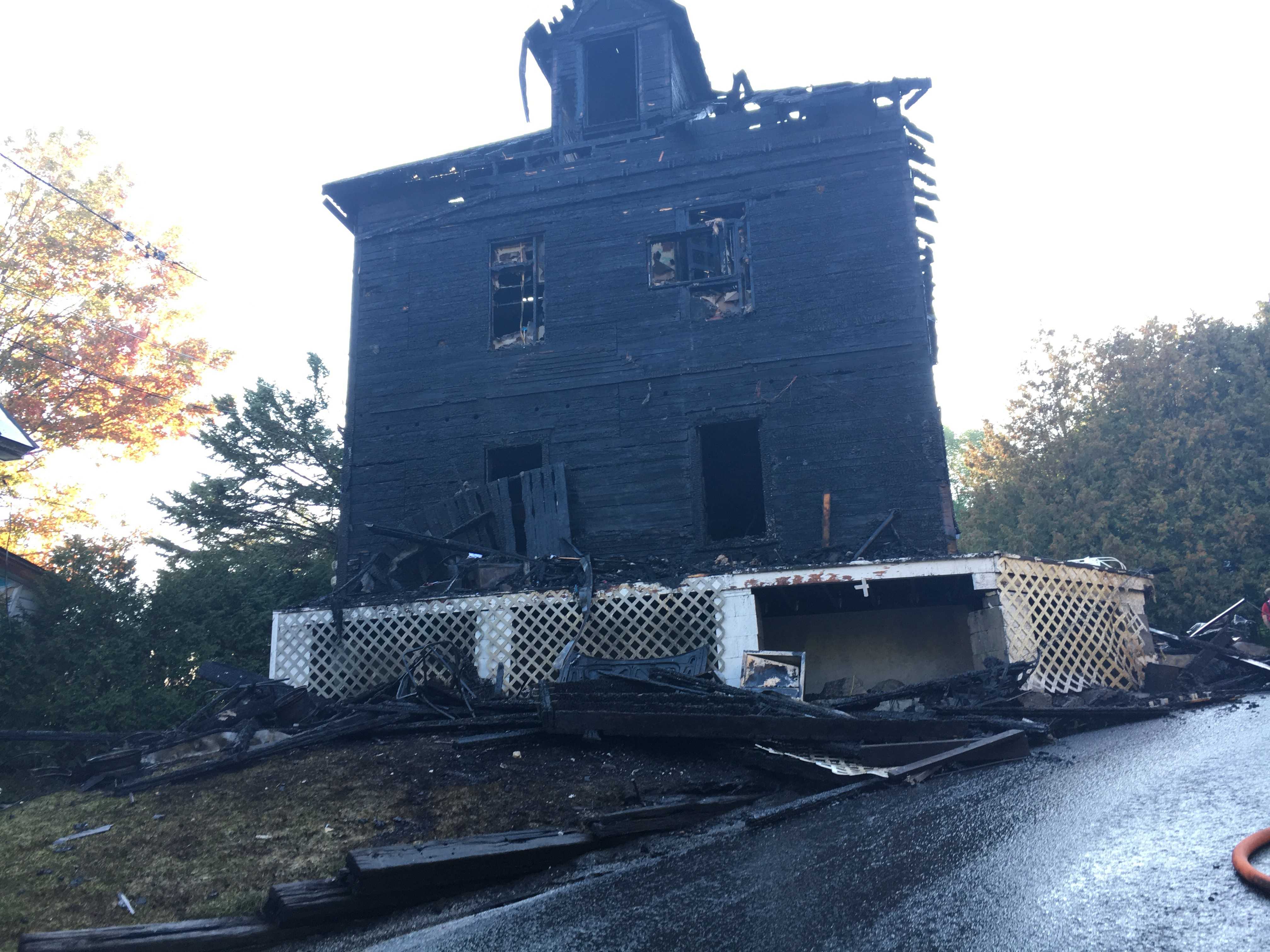 Man's dog alerts him of fire at neighbor's home