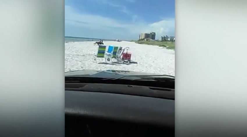 'We're flying, brah!' Man livestreams beach chase