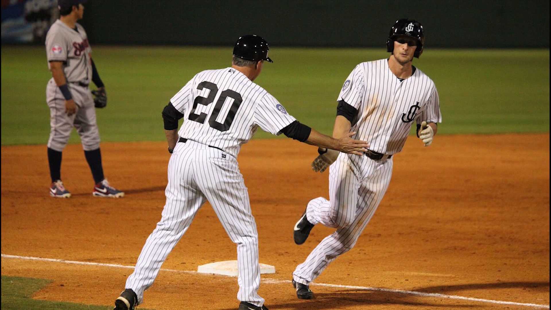 Pro baseball player switches uniforms