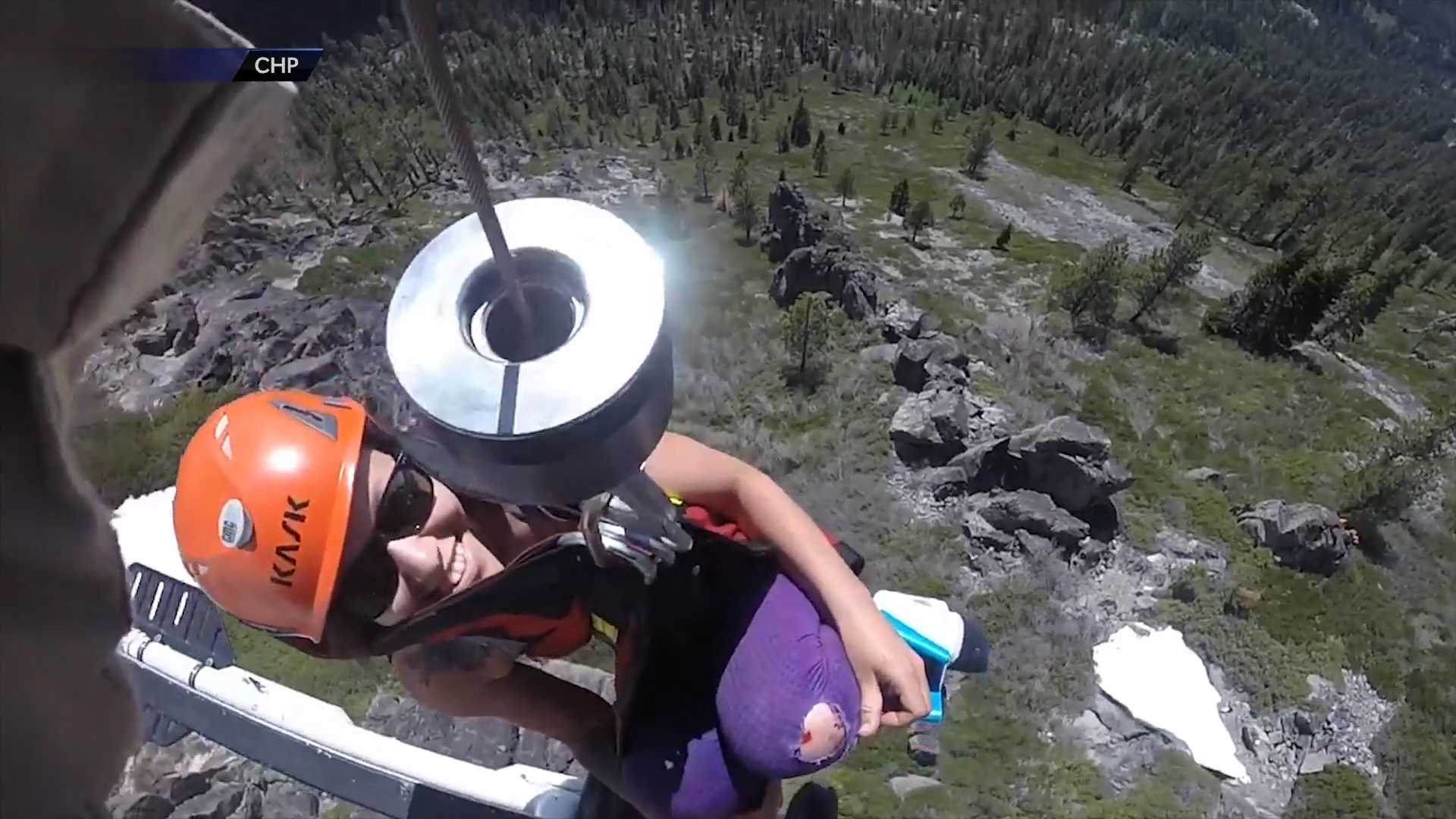 Watch a mountainside airlift rescue from inside the chopper
