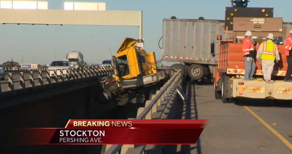 Big rig dangles off I-5 in Stockton; snarls traffic