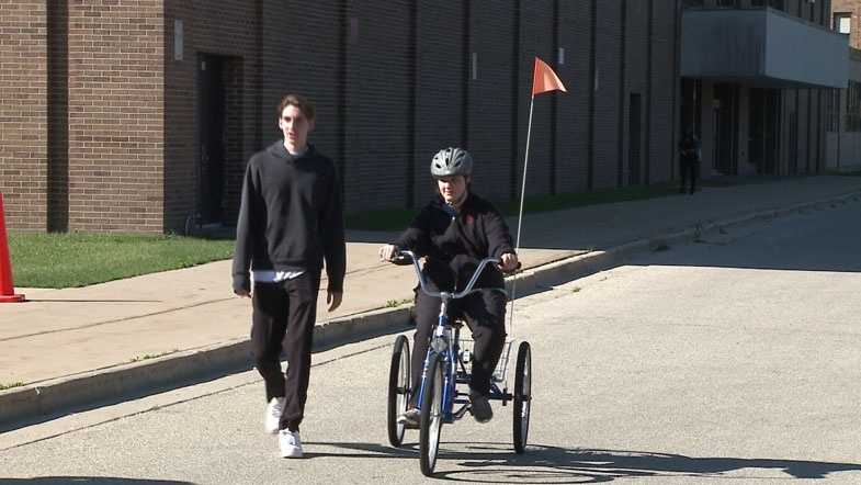 High school students with disabilities learn to ride bike for first time