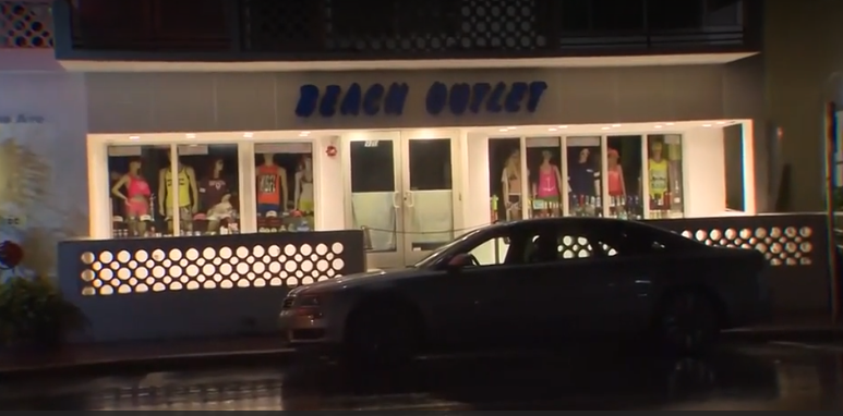 Caught on camera: Bikini-wearing bandits scuffle with shop owner