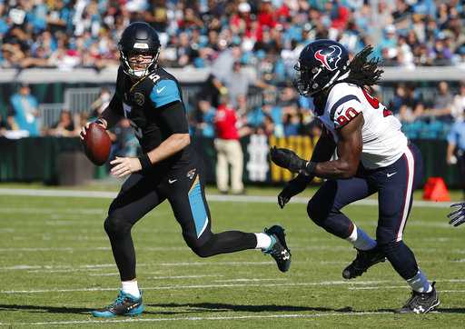 NFL player fills trash cans with toys after facing taunts by Jaguars fans
