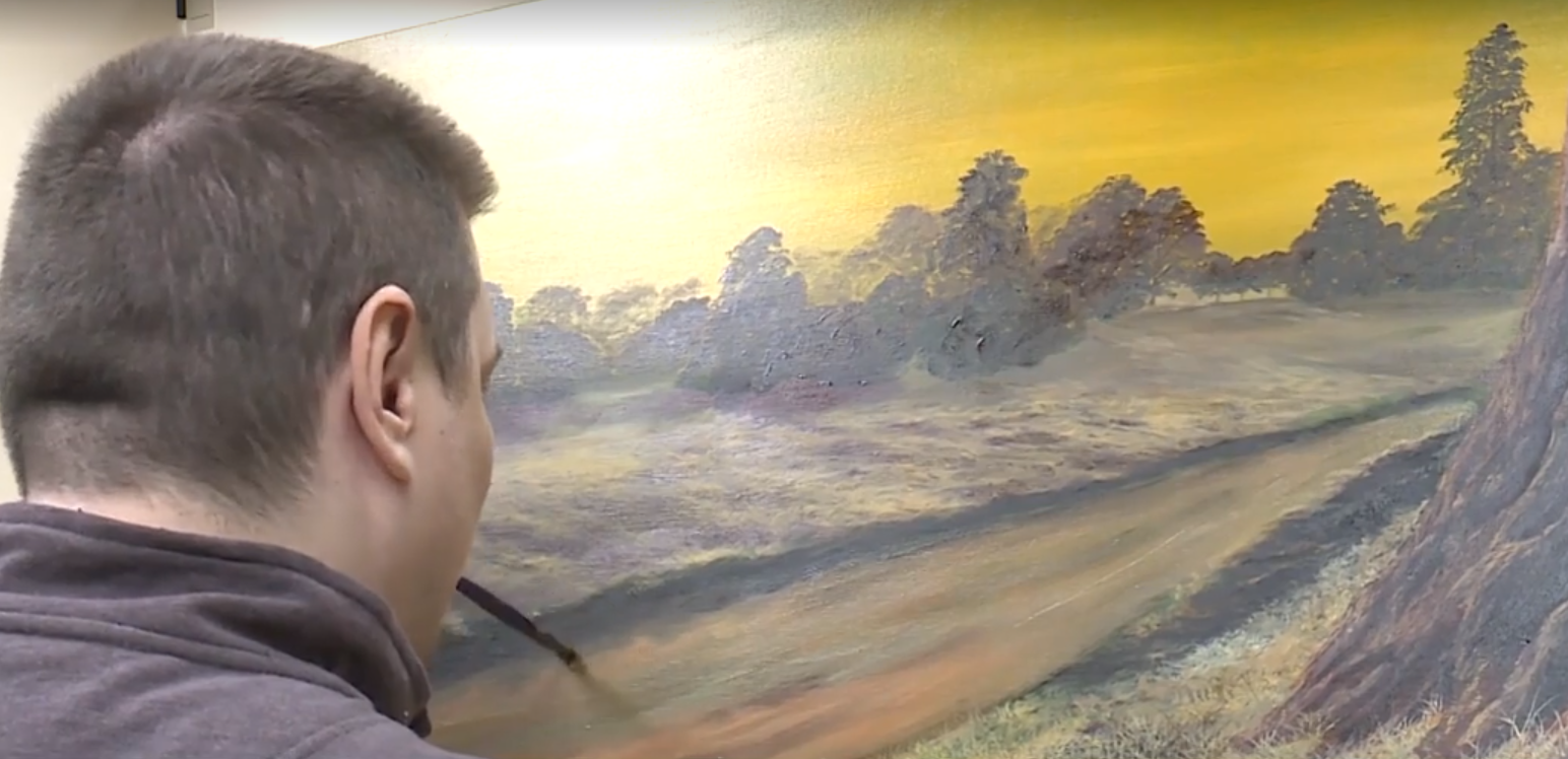 Paralyzed man overcomes adversity to create beautiful works of art