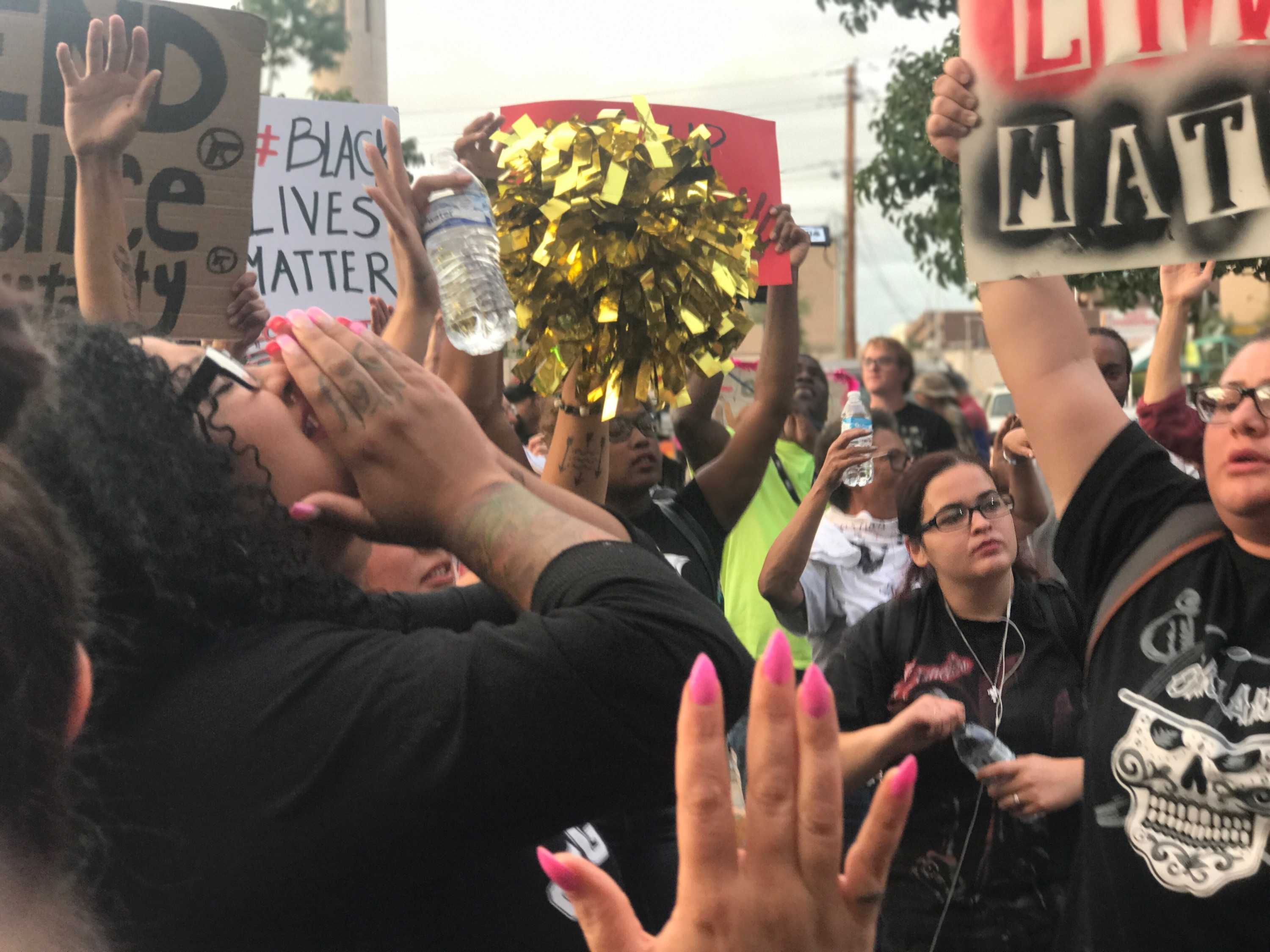 Black Lives Matter protesters march down Central