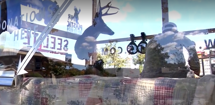 Man lives in box to raise awareness of mentoring program