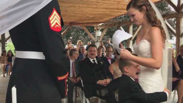 Boy, 4, breaks down in tears during wedding while embracing new mom