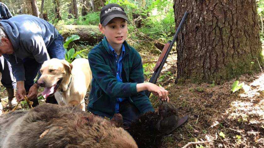 Boy, 11, shoots charging bear to save fishing party in Alaska