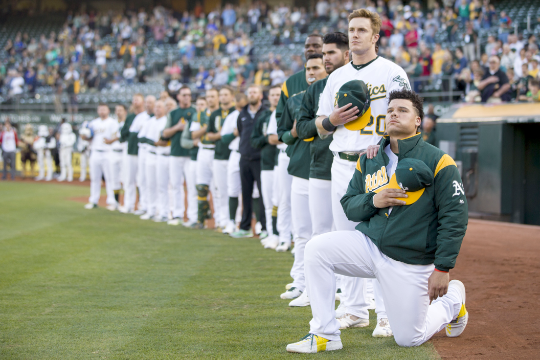 Bruce Maxwell becomes first MLB player to kneel during national anthem