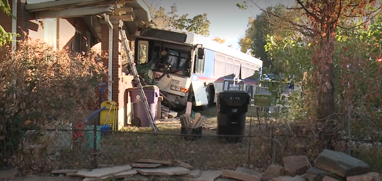 Transit bus barely misses family after slamming into home