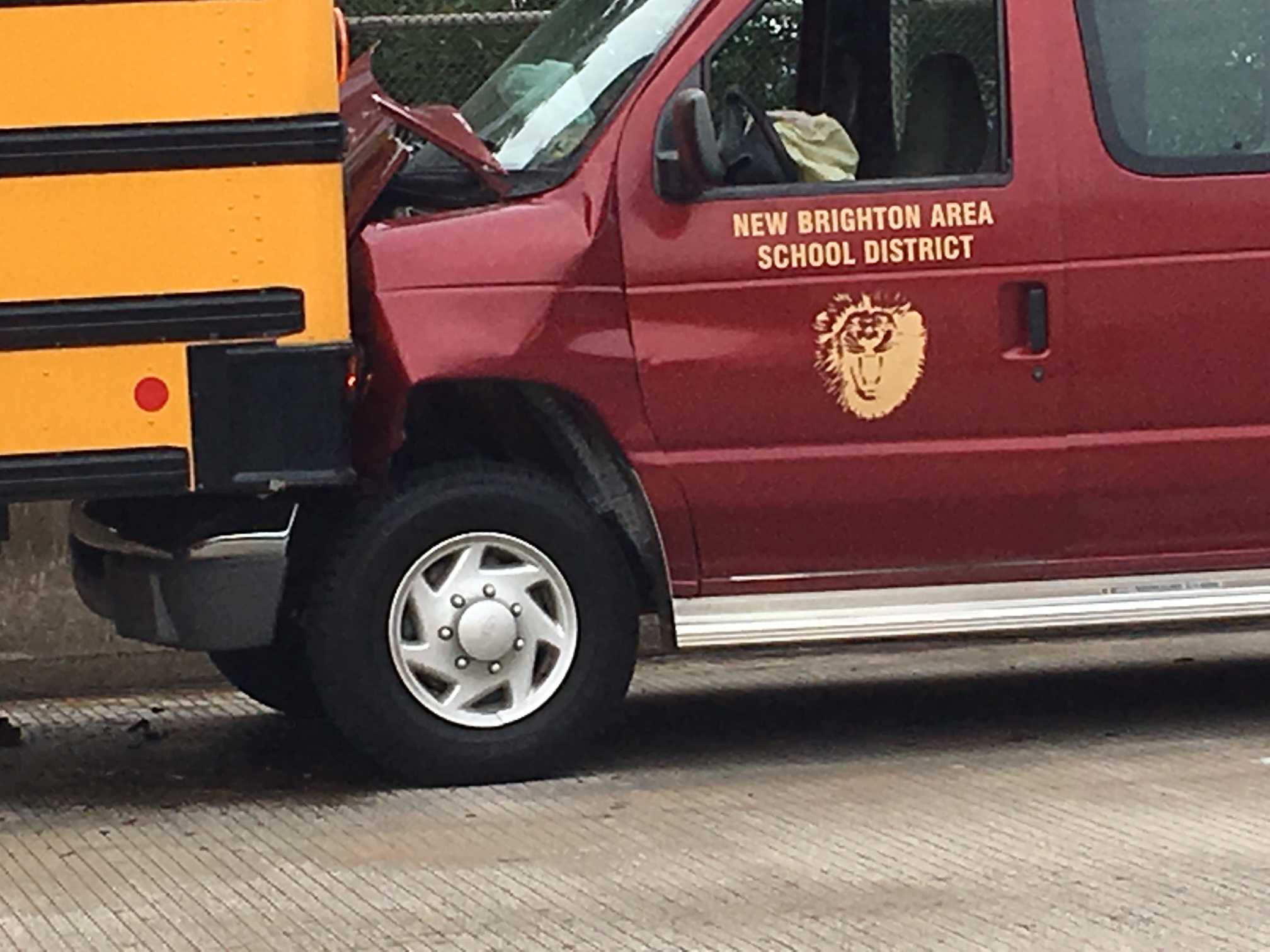 Multiple students taken to hospital after van hits school bus