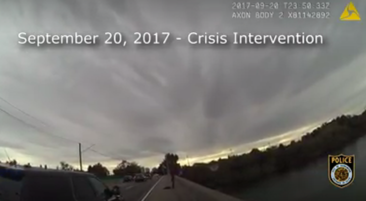 Caught on camera: Police officer saves woman from jumping off bridge