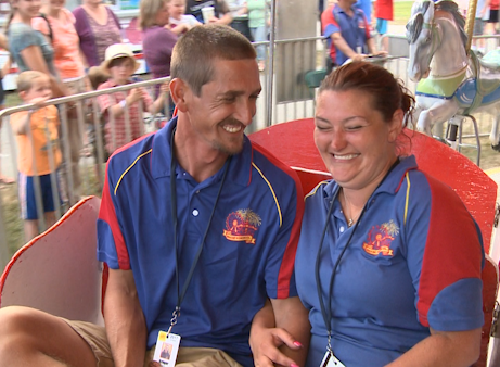 Adorable: Carnival workers get married on merry-go-round