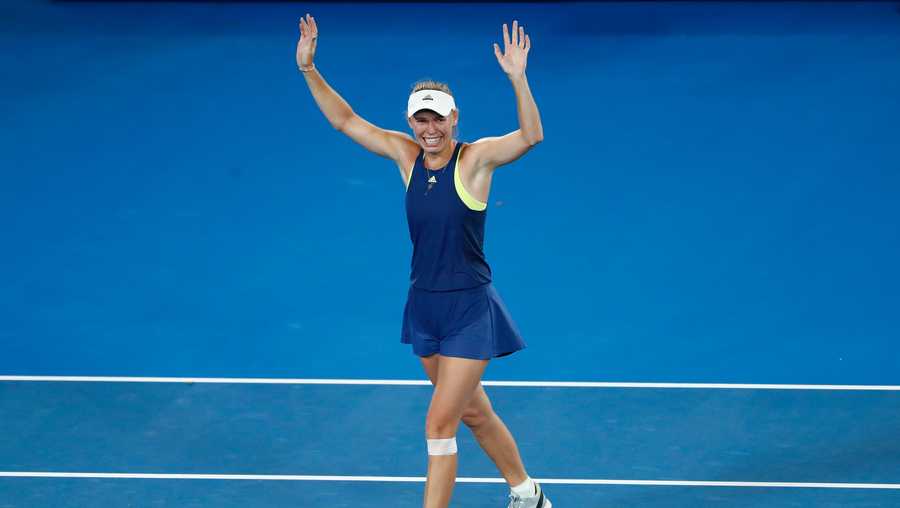  Caroline Wozniacki of Denmark reacts after winning championship point in her women's singles final against Simona Halep of Romania on day 13 of the 2018 Australian Open at Melbourne Park on January 27, 2018 in Melbourne, Australia.