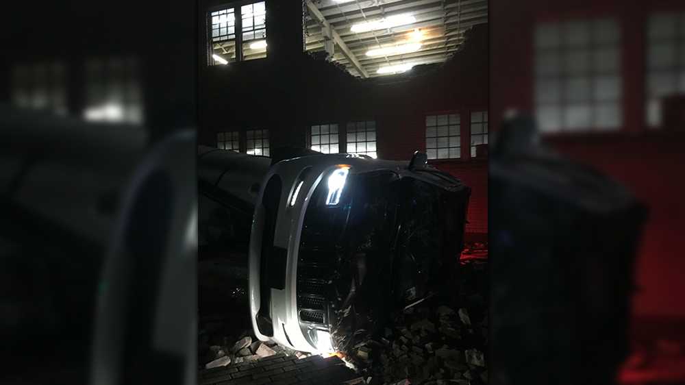 Valet backs car out of second floor of Sacramento parking garage