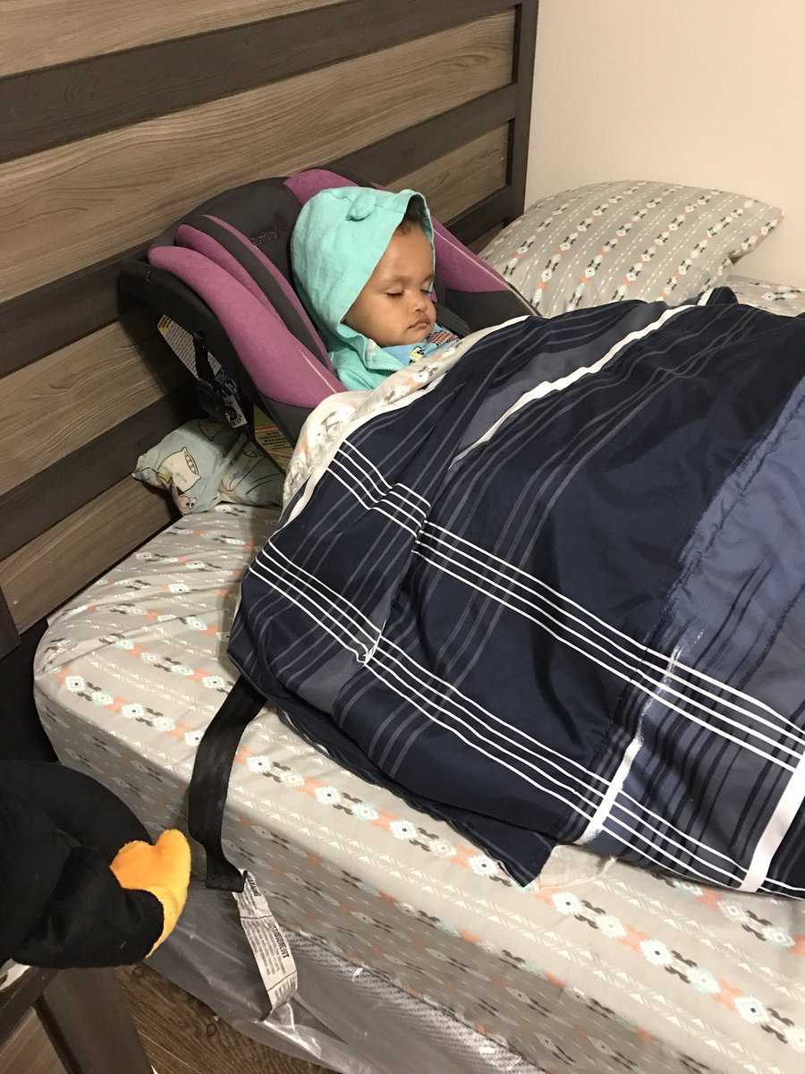 Photo goes viral of dad's way of putting daughter to bed