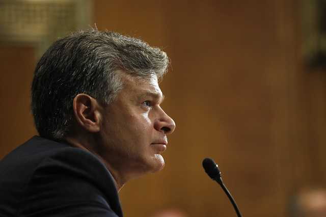 FBI director defends agency after Trump bashing