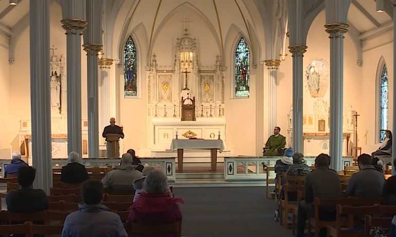 Harsh flu season leads to changes in Mass at Catholic churches