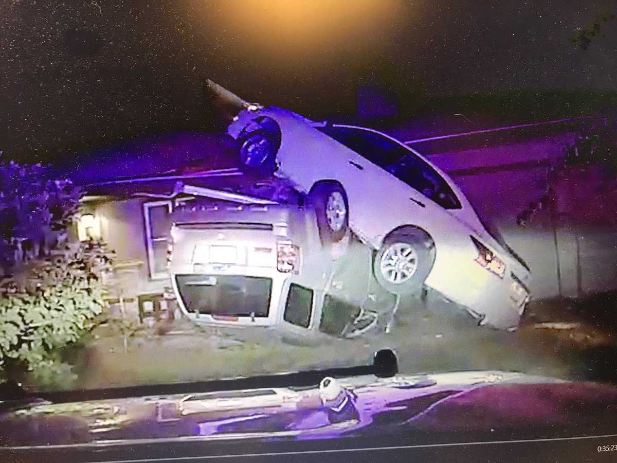 Car fleeing deputies crashes, ends up on top of another vehicle