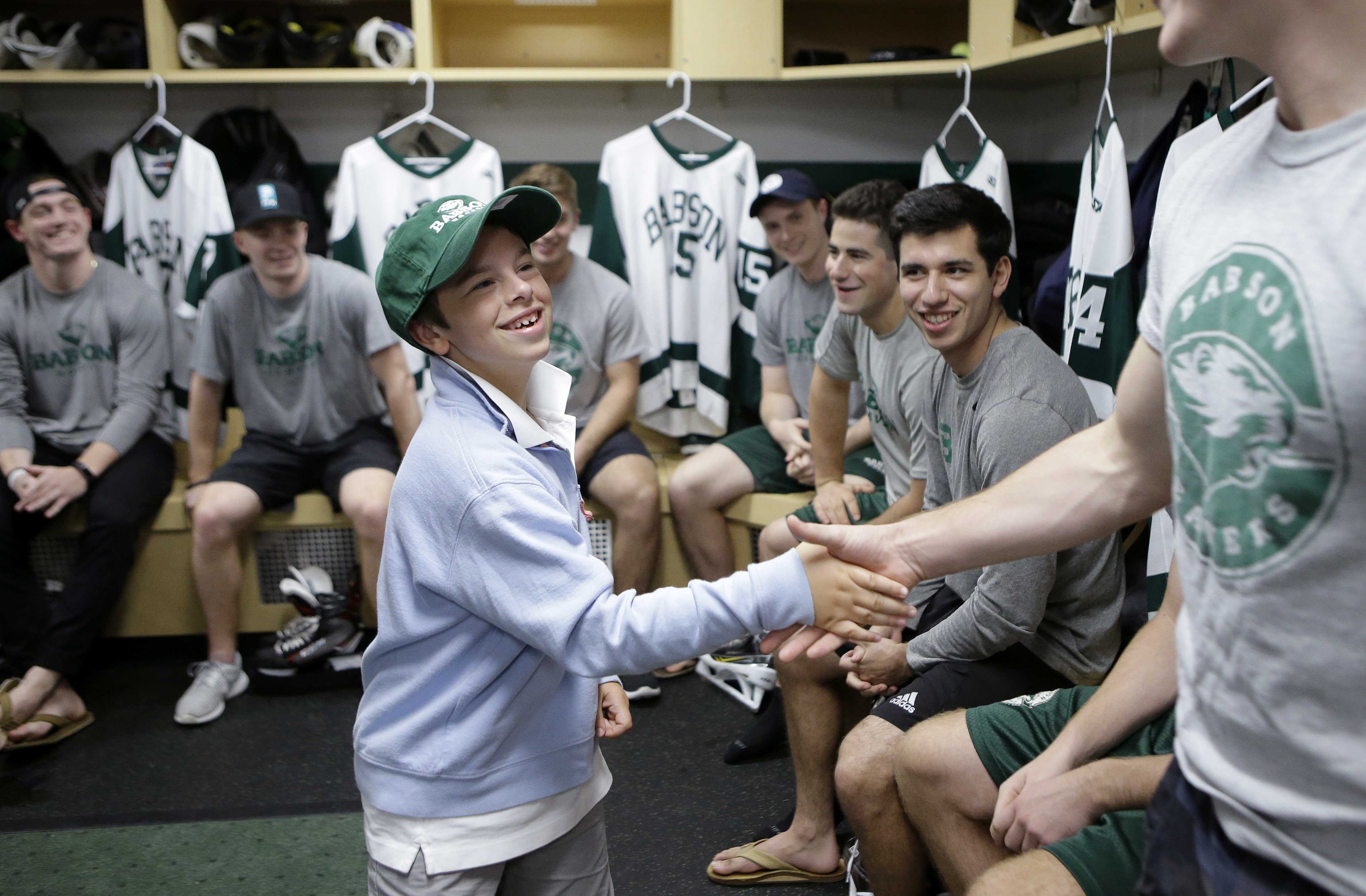 Chronically ill 4th-grader recruited by college hockey team