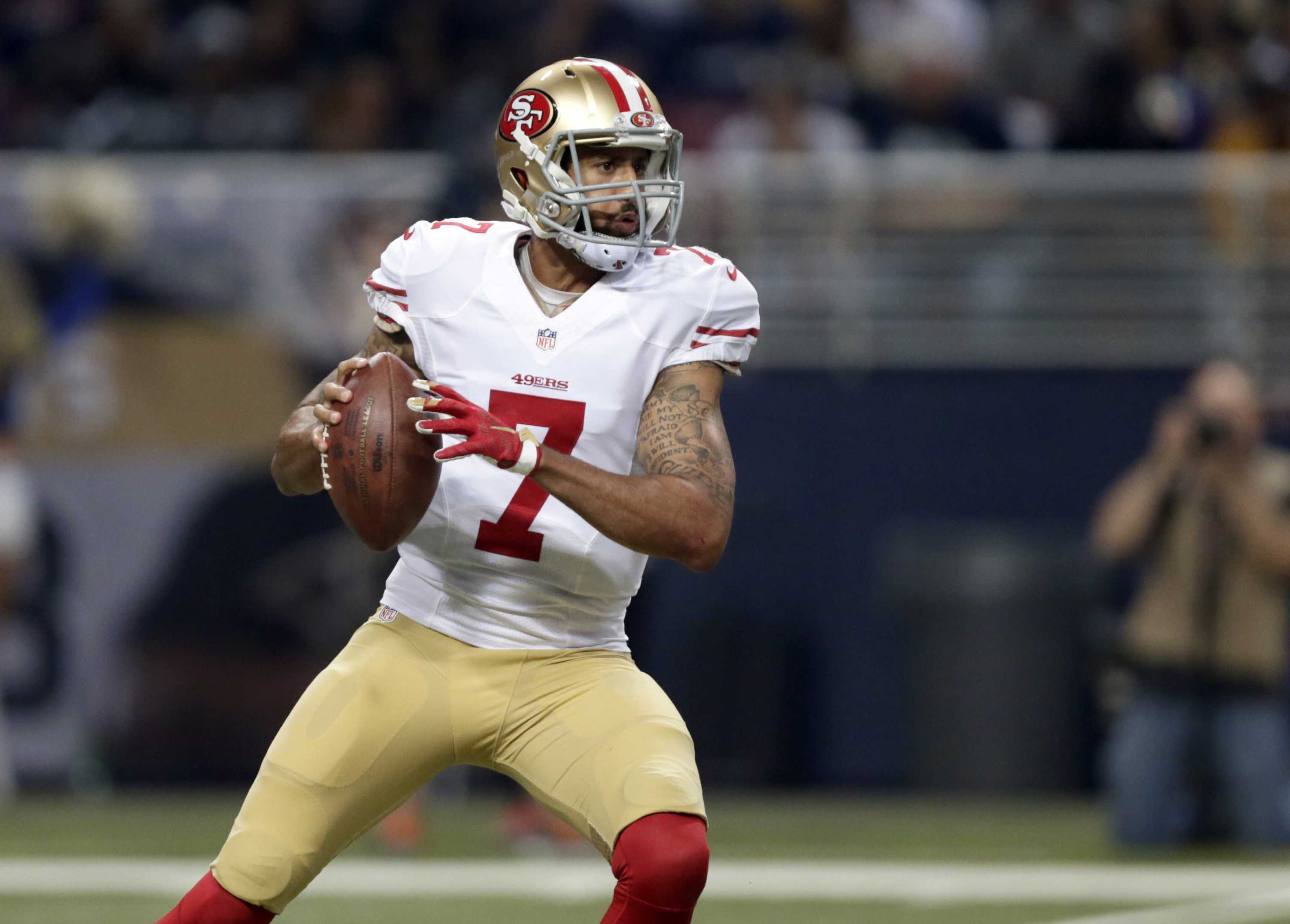NFL players buy an Xbox for boy wearing Kaepernick jersey