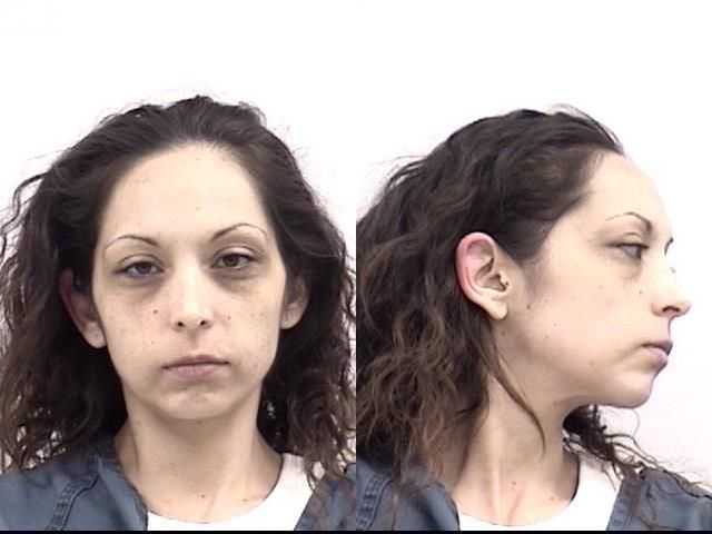 Police: Woman arrested after boy, 3, accidentally shoots younger brother