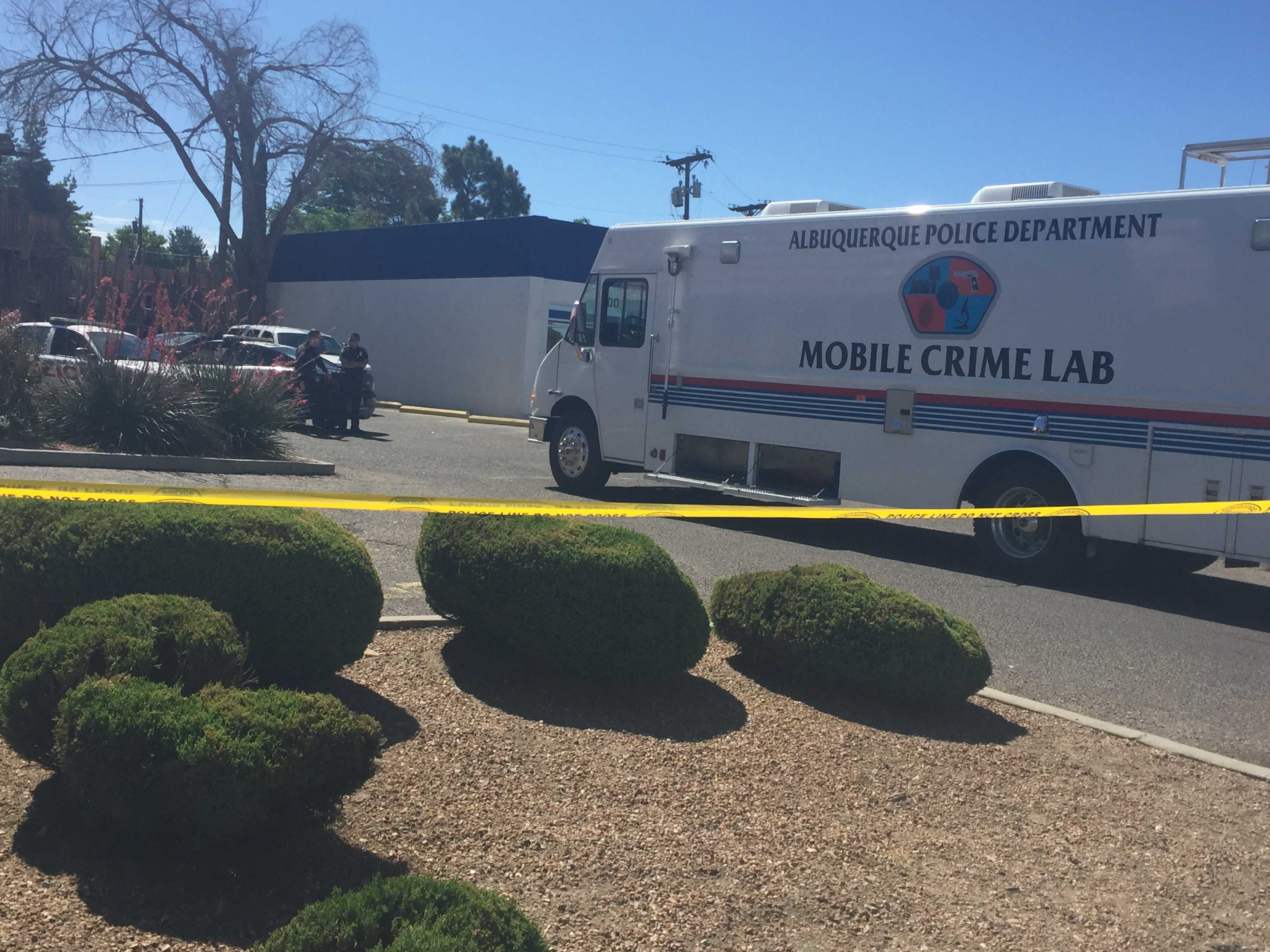 Albuquerque Police investigate body found in parking lot